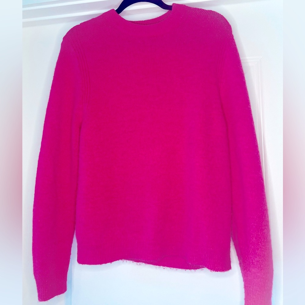 Bright pink “a new day” sweater